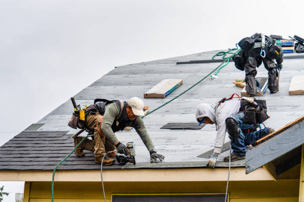 Professional Roofing technician working in Colchester, VT